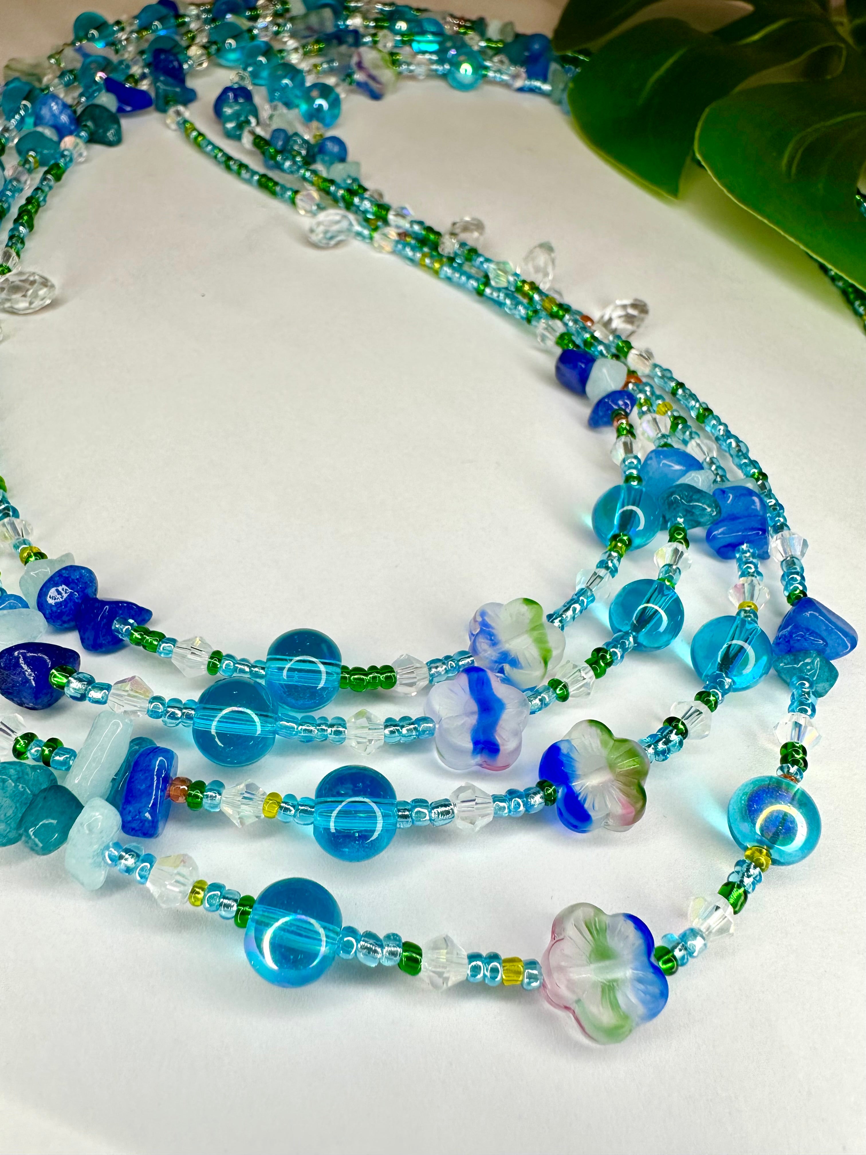 Multicolor Seadbead Waistbeads with Flower Accent Beads and Quartz Crystals on Wire