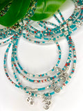 Turquoise Red Seadbead Waistbeads with Silver OM Charm on Wire
