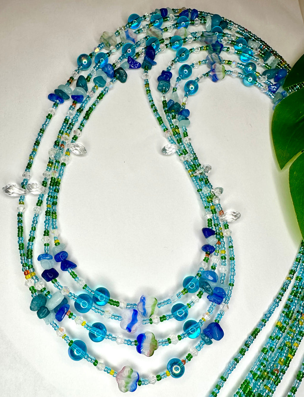 Multicolor Seadbead Waistbeads with Flower Accent Beads and Quartz Crystals on Wire