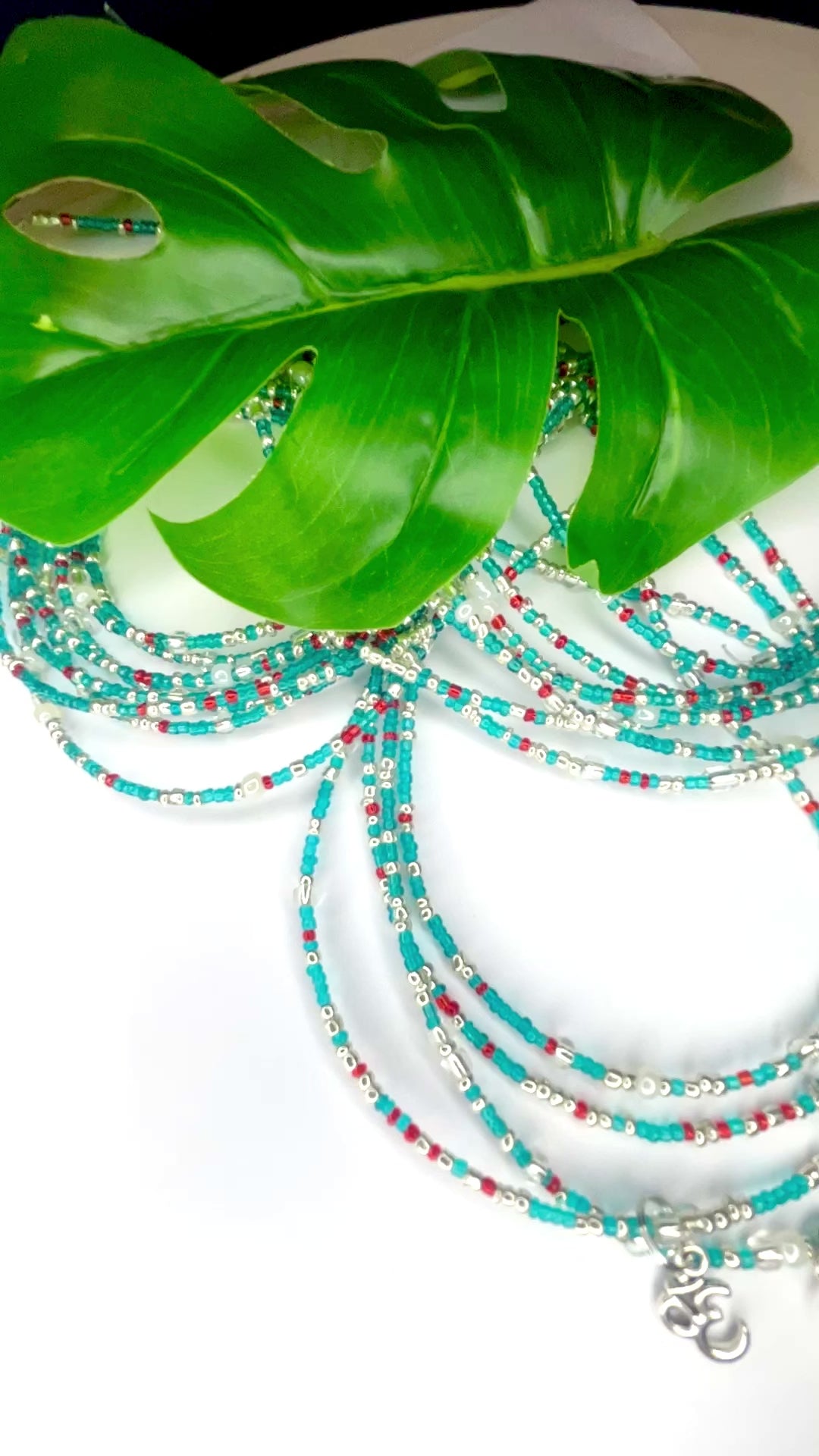 Turquoise Red Seadbead Waistbeads with Silver OM Charm on Wire